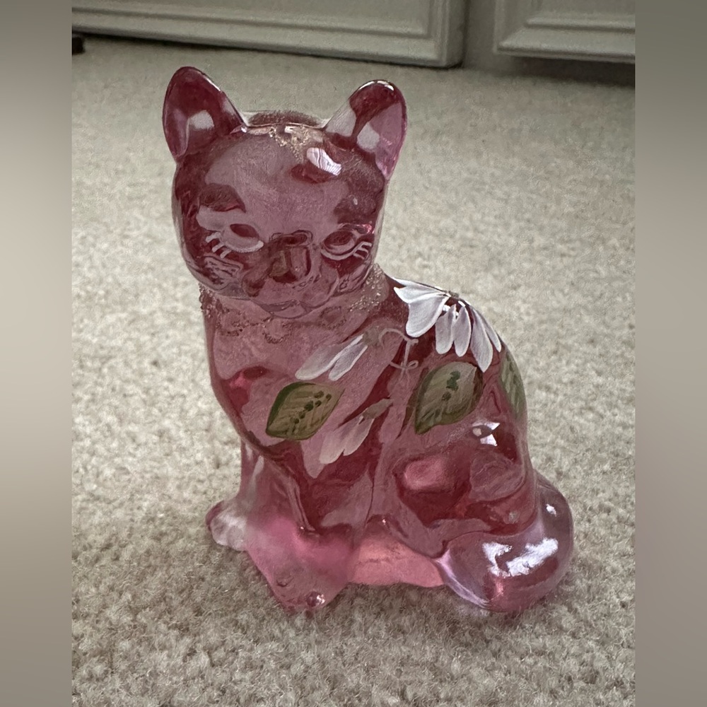Painted pink glass cat figurine with flowers